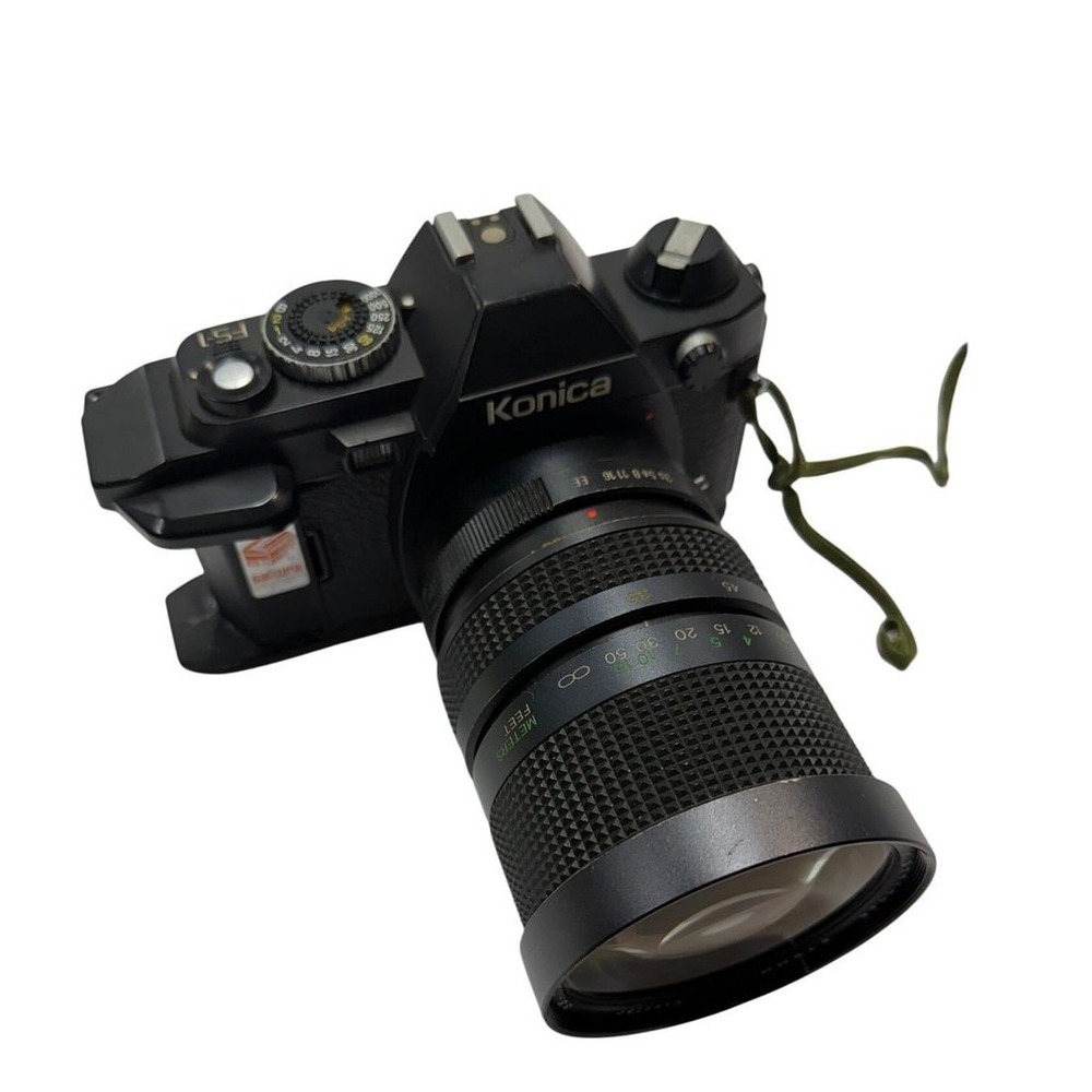 Konica FS-1 35mm SLR Film Camera with 35-105mm Zoom Lens and UV Filter